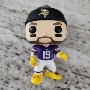 Funko Pop! Figure with Purple Jersey and Yellow Accents